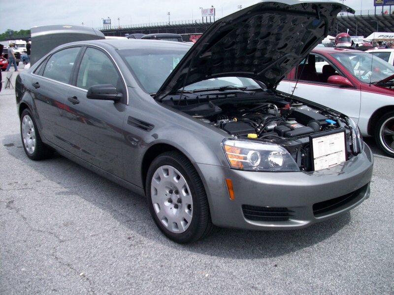 Gray Sedan with Open Hood