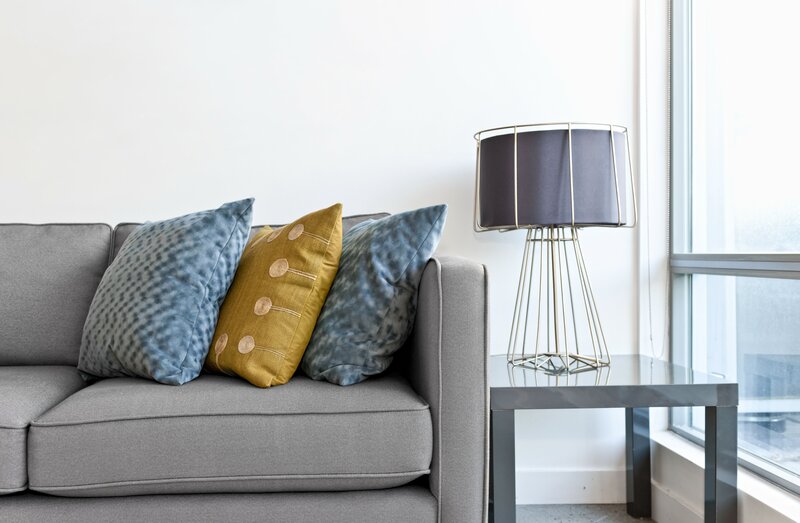 Gray sofa with decorative pillows
