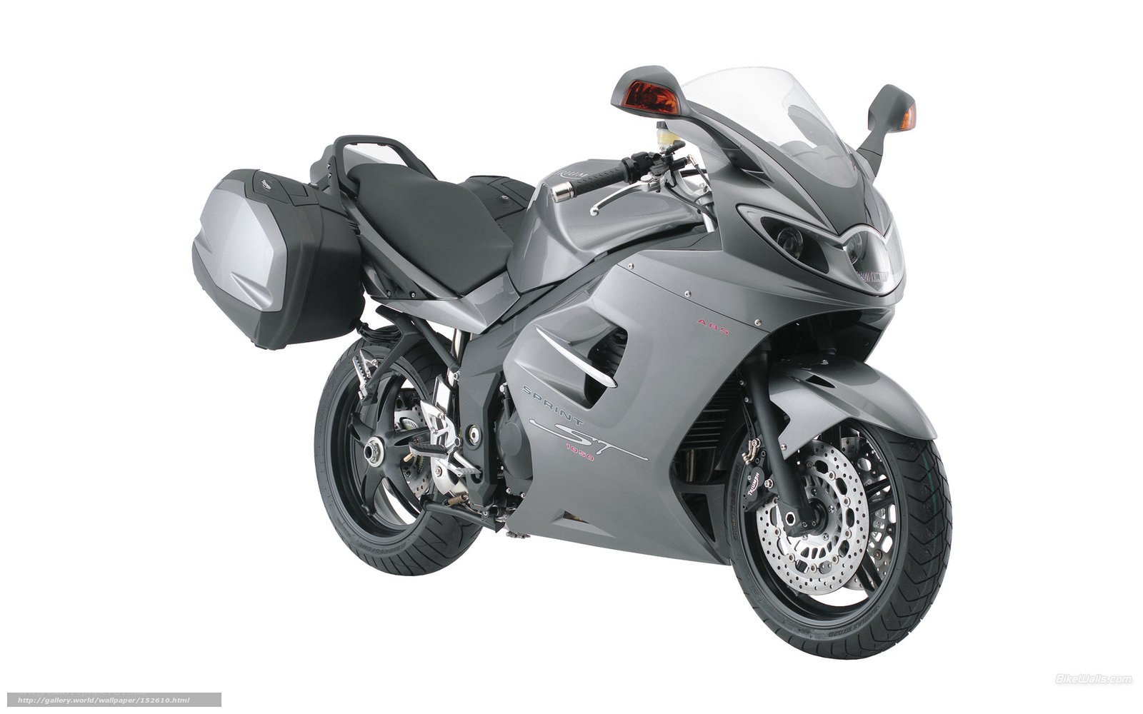 gray sport motorcycle with luggage