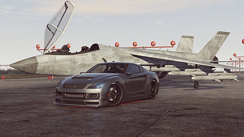 Gray Sports Car and Jet — Dramatic