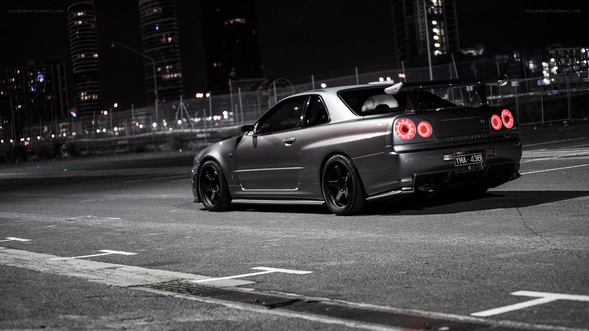gray sports car at night