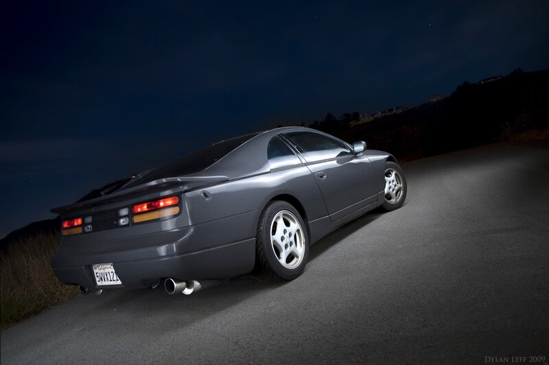 Gray sports car at night