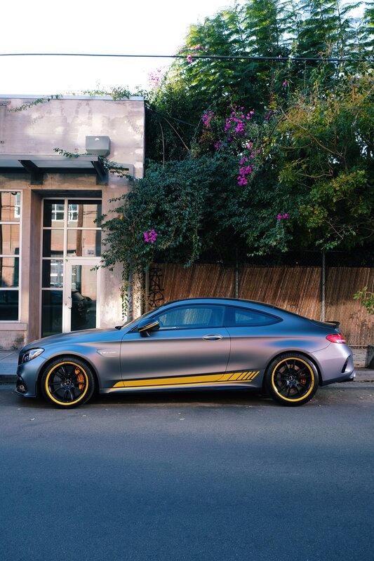 Gray Sports Car — Calm, Afternoon, Photograph, Building