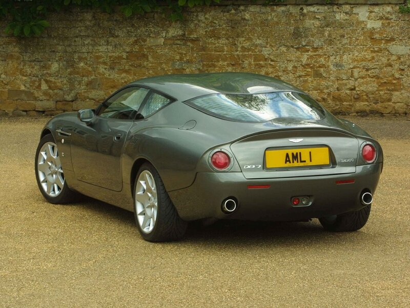 Gray Sports Car — Calm, Afternoon, Photograph, Stone Wall