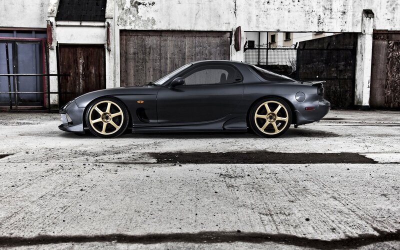 Gray Sports Car — Dramatic, Photograph, Building