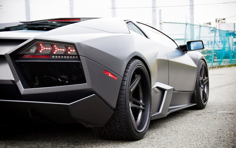 Gray Sports Car — Dramatic, Photograph, Tire, Road