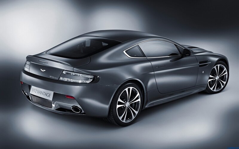 Gray Sports Car — Dramatic, Photograph, Wheels, Exhaust