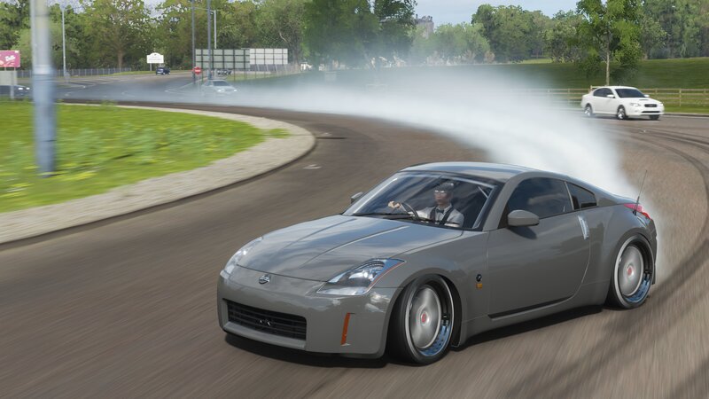 Gray Sports Car Drifting