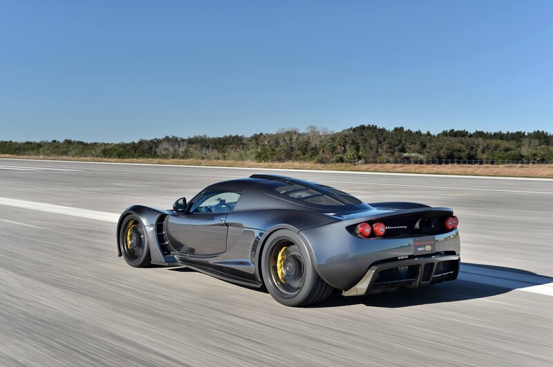 Gray Sports Car — Dynamic, Afternoon, Photograph, Race Track