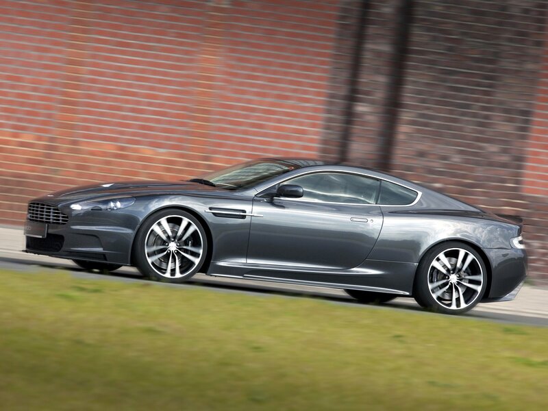 Gray Sports Car — Dynamic, Photograph, Brick Wall