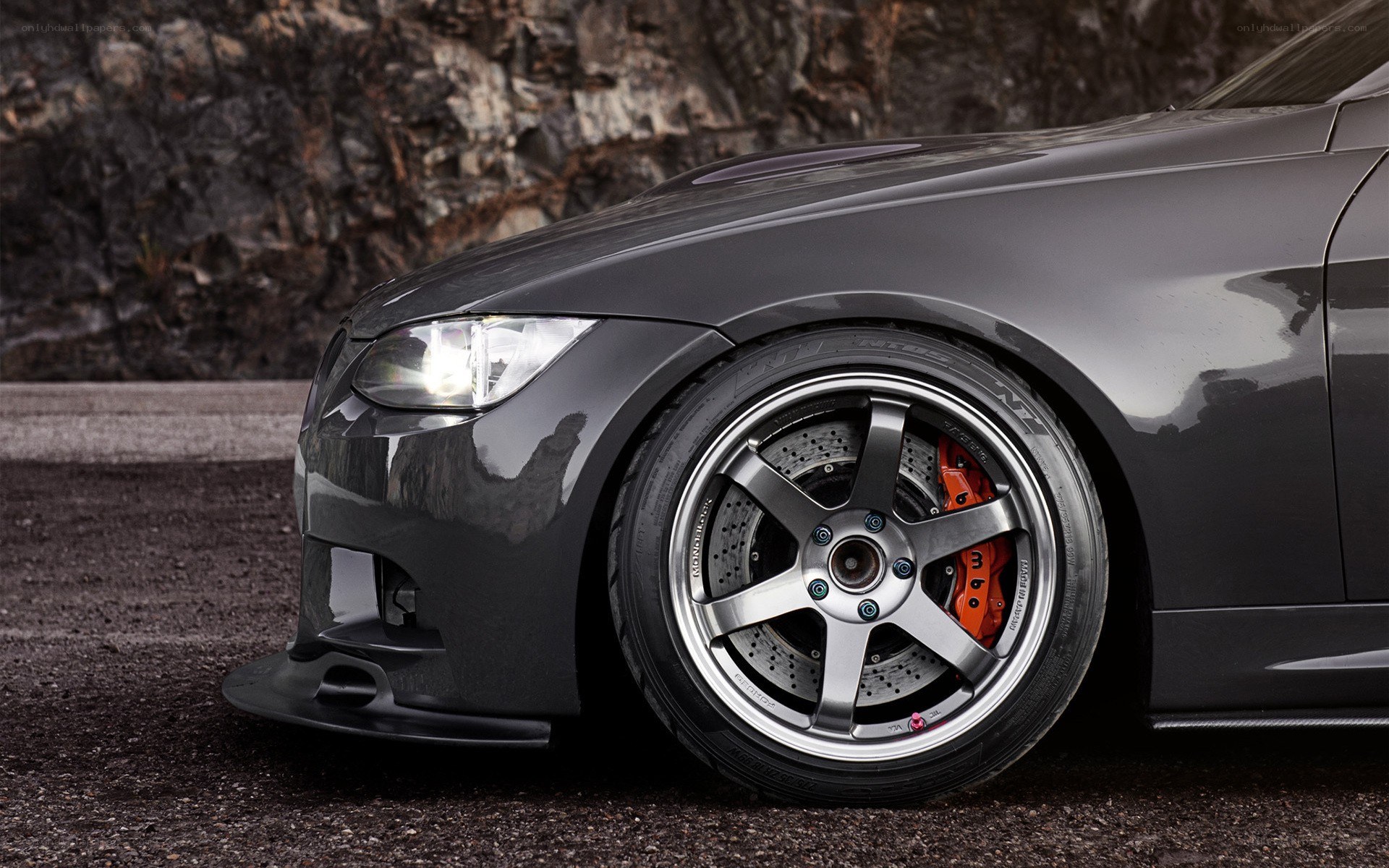 gray sports car front wheel