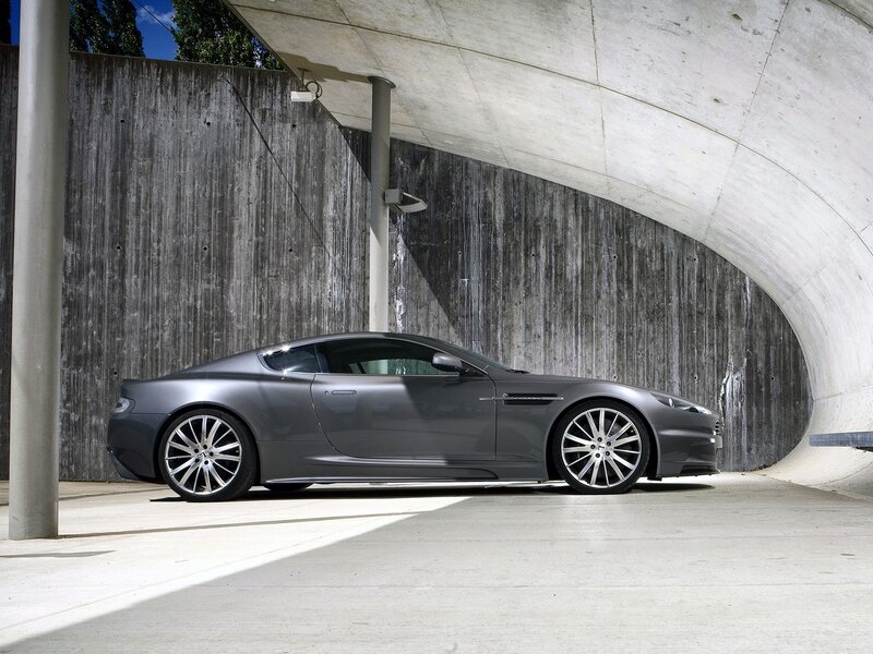 Gray sports car in concrete tunnel