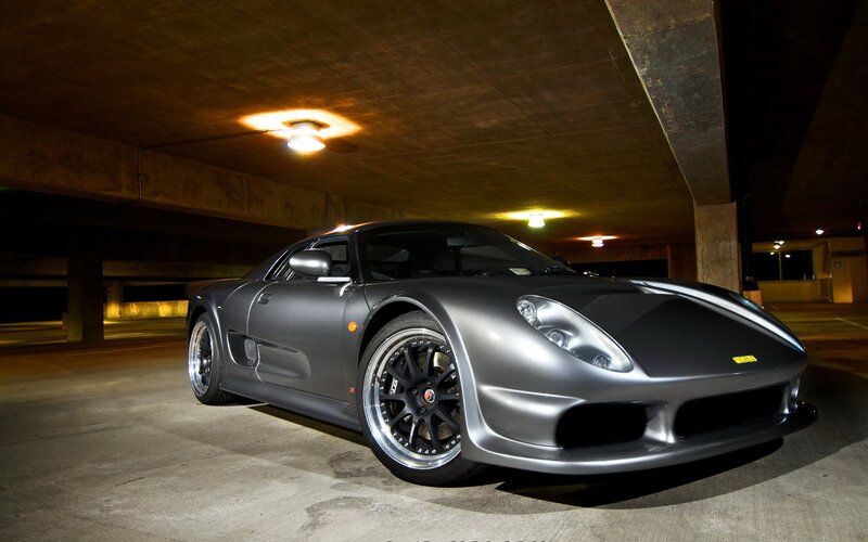 gray sports car in garage