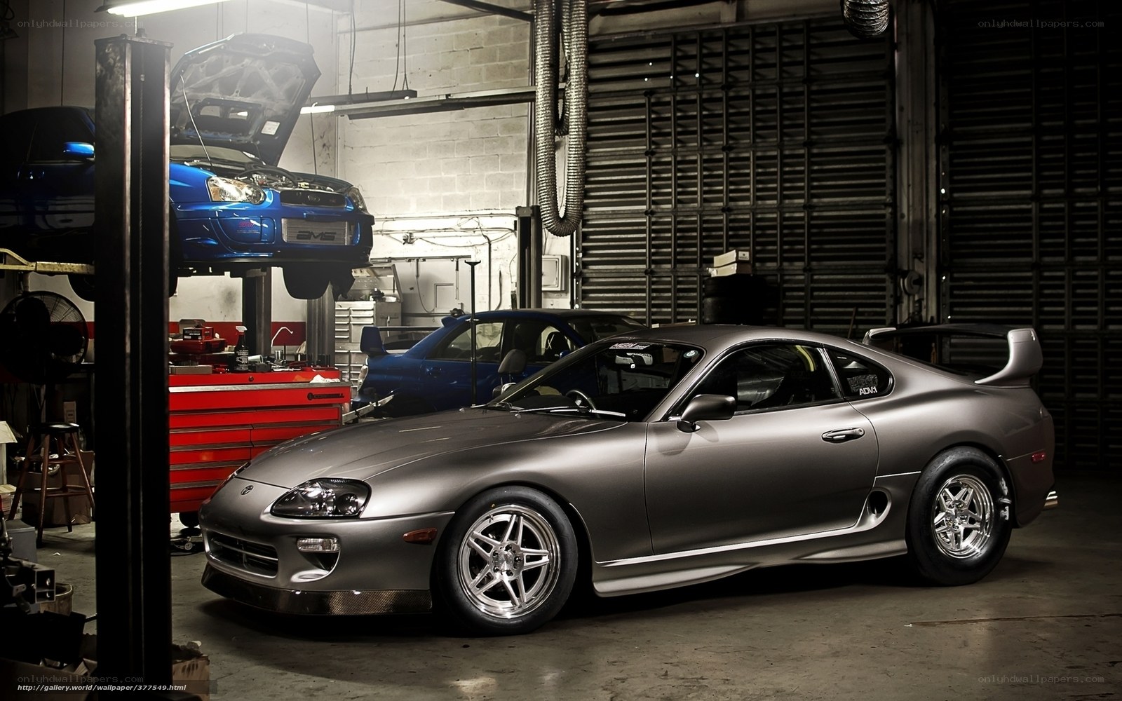Gray sports car in garage