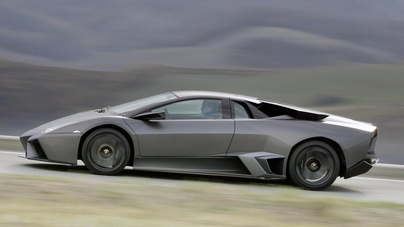 gray sports car in motion