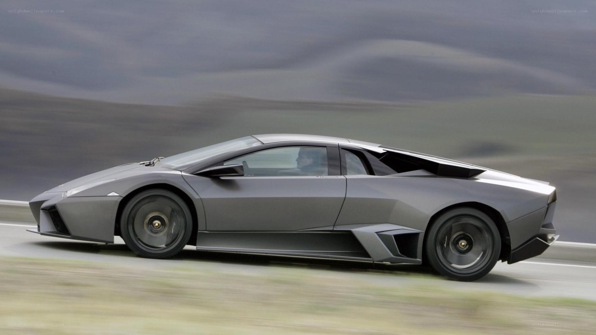 gray sports car in motion