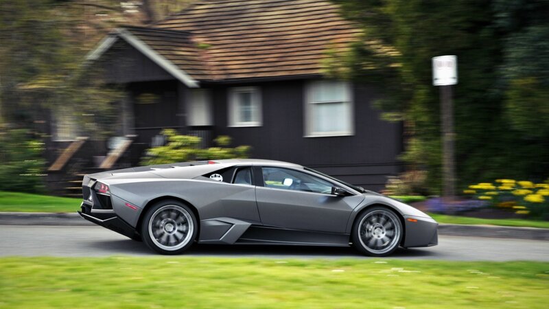 gray sports car in motion