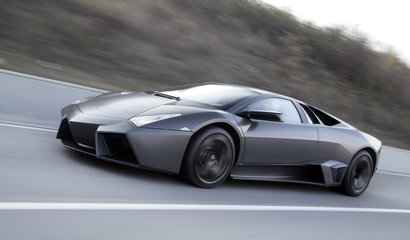 gray sports car in motion
