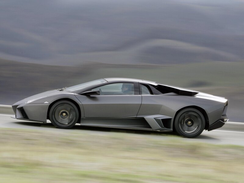 gray sports car in motion