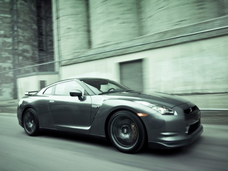gray sports car in motion