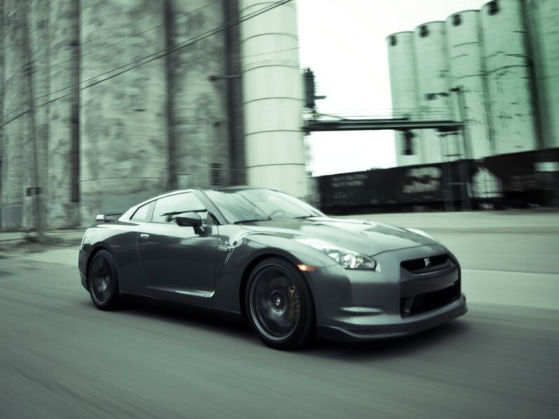 gray sports car in motion
