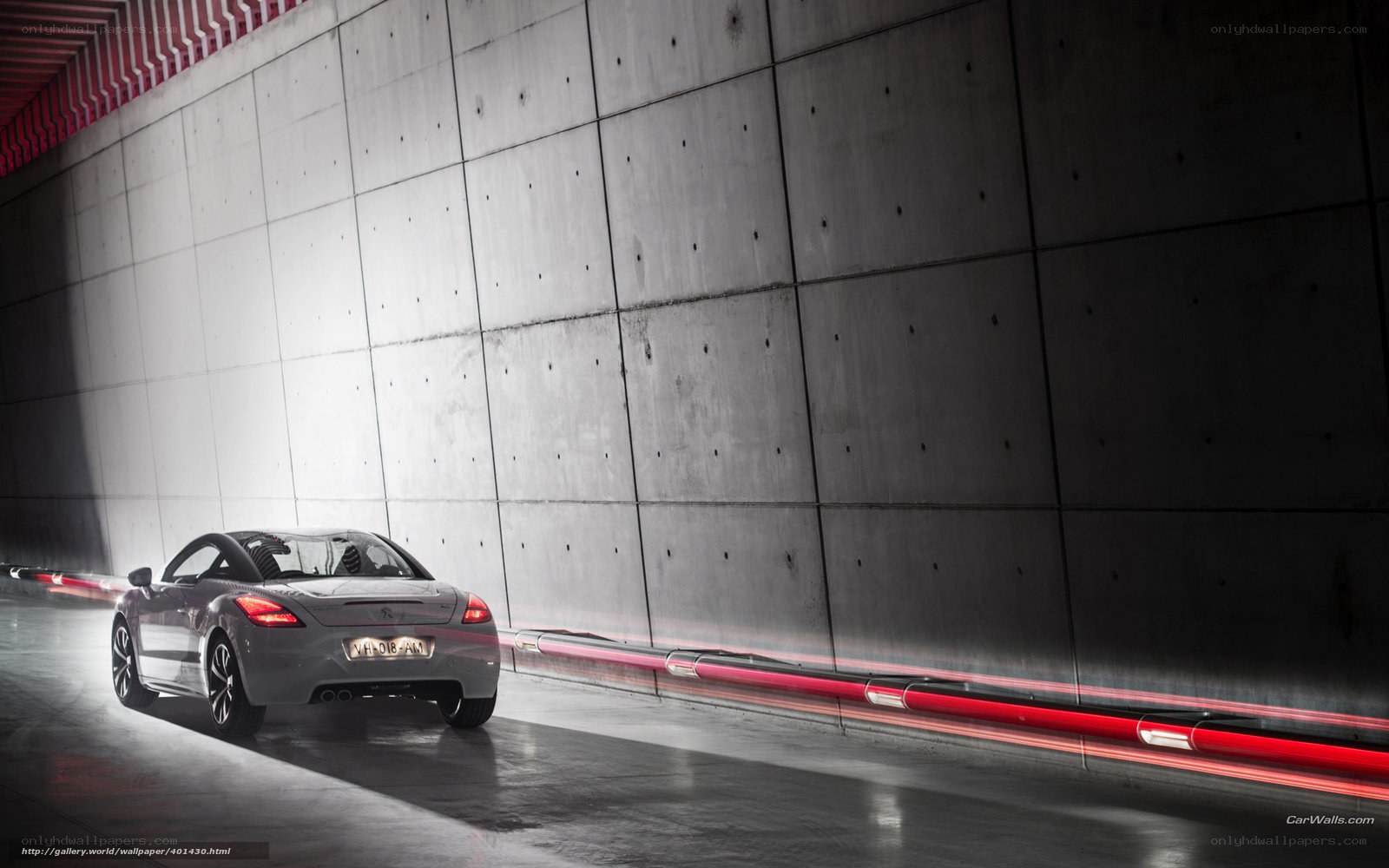 Gray sports car in tunnel