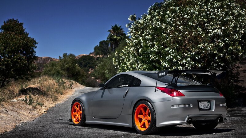 gray sports car on a road