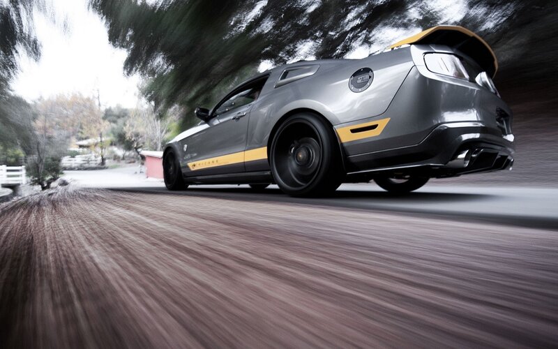 gray sports car on a road