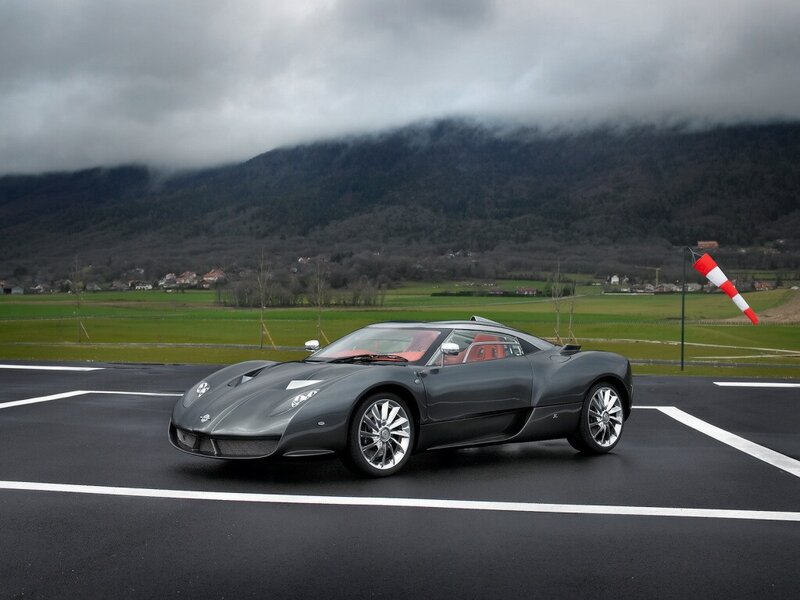 Gray sports car on a tarmac