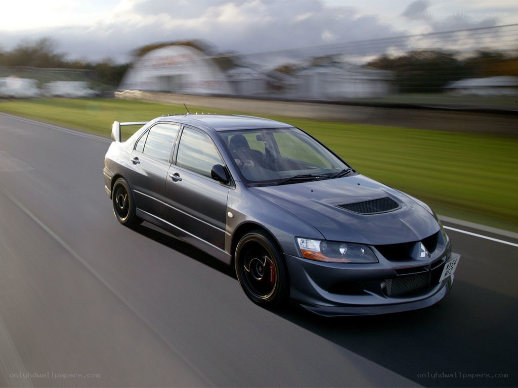 gray sports car on a track