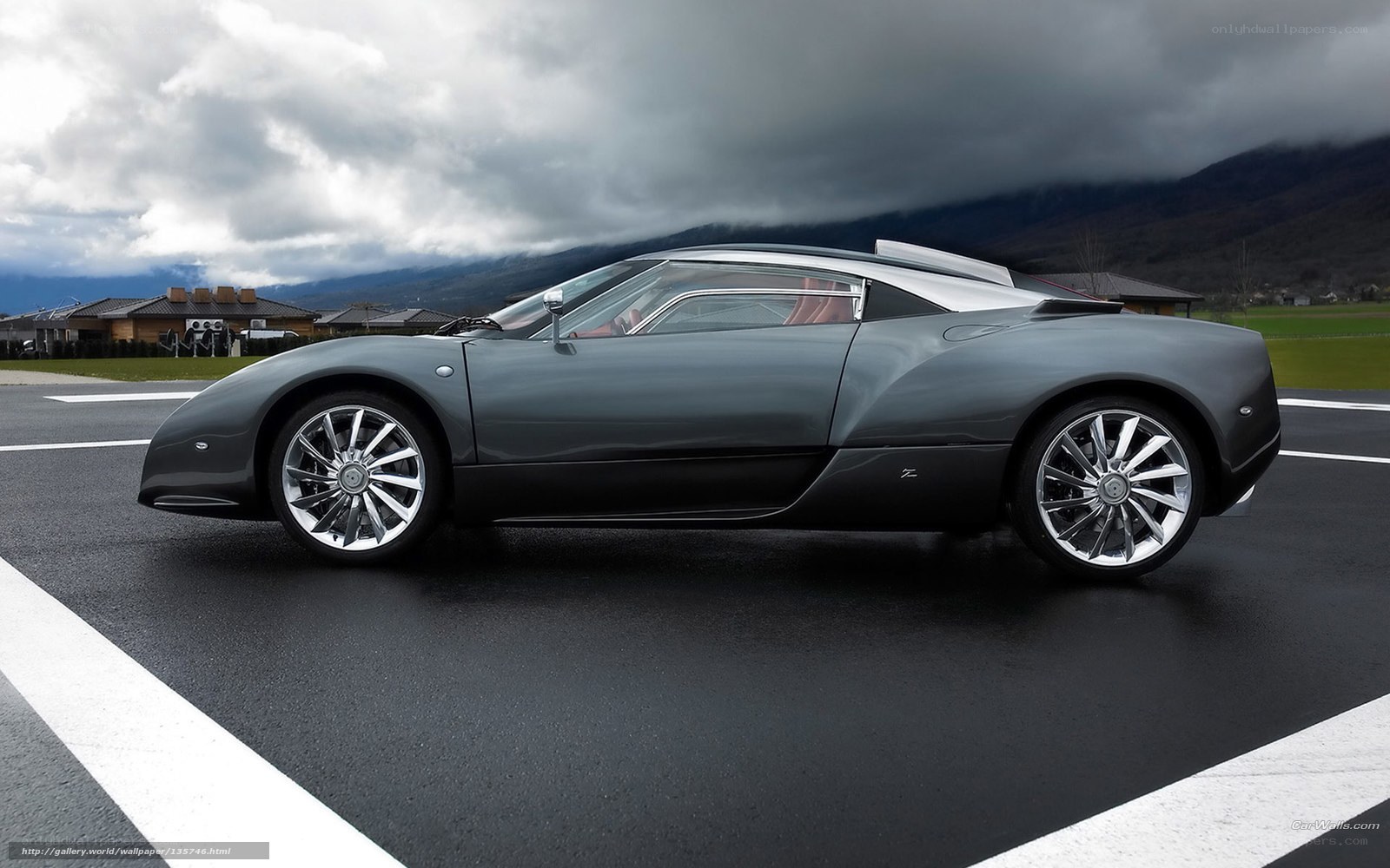 gray sports car on asphalt