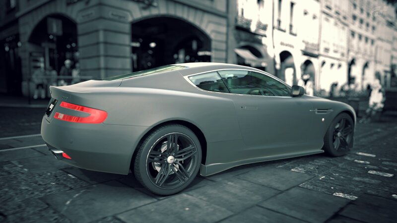 gray sports car on city street