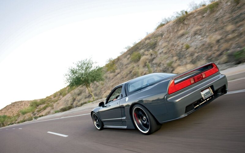 gray sports car on desert road