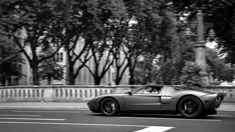 Gray Sports Car on Road — Black