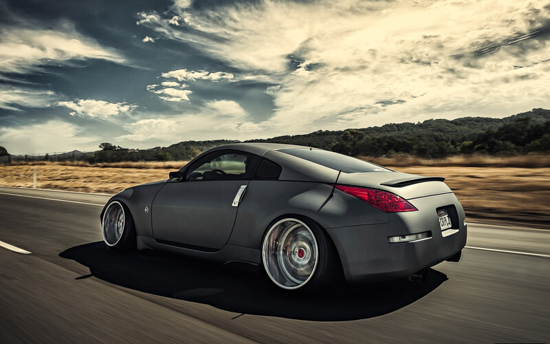 Gray Sports Car on Road — Dramatic, Afternoon