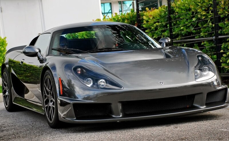 gray sports car parked outside