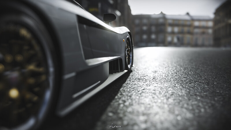 Gray Sports Car Wheel — Dramatic, Photograph