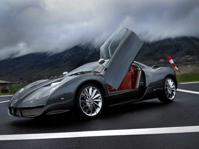 gray sports car with open door