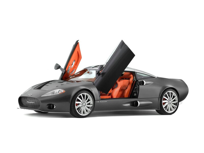 gray sports car with open doors