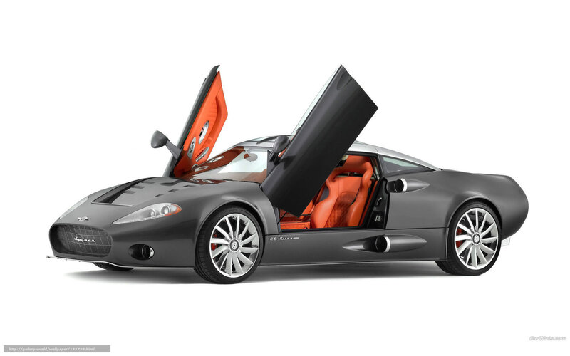 gray sports car with open doors
