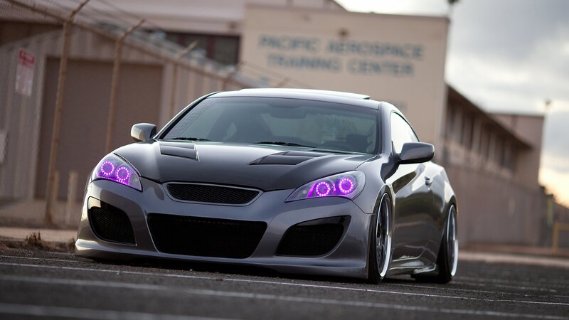 gray sports car with purple lights