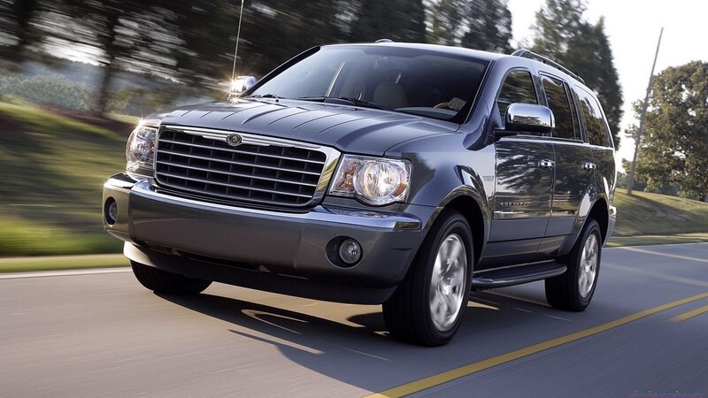 gray suv driving on road