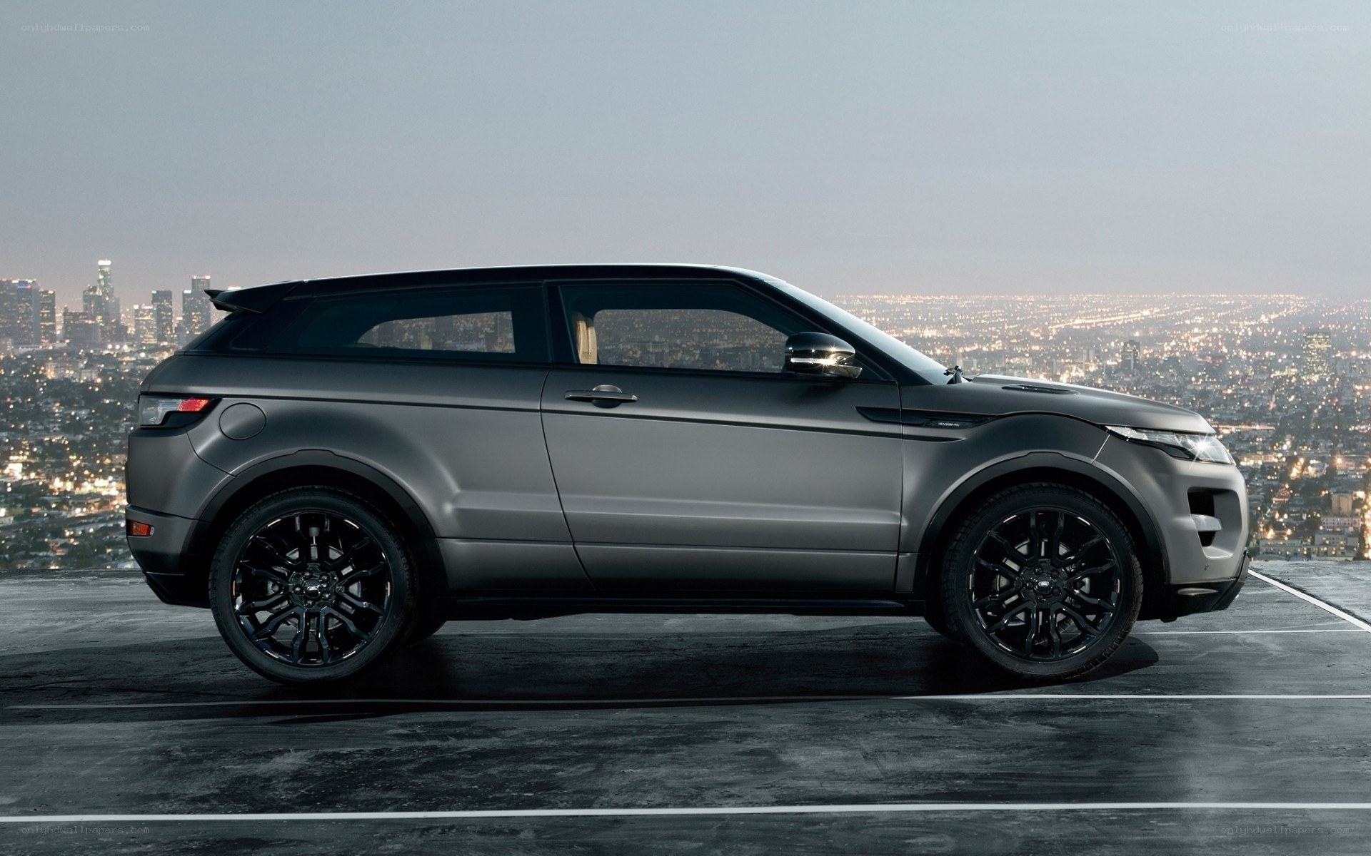 Gray SUV on city overlook