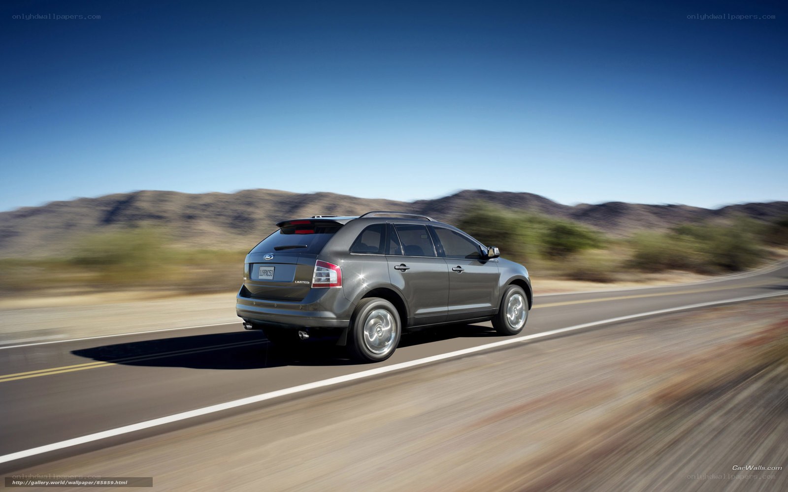 gray suv on desert road