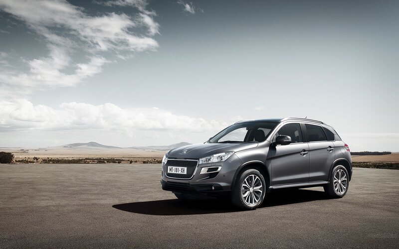 Gray SUV on open road