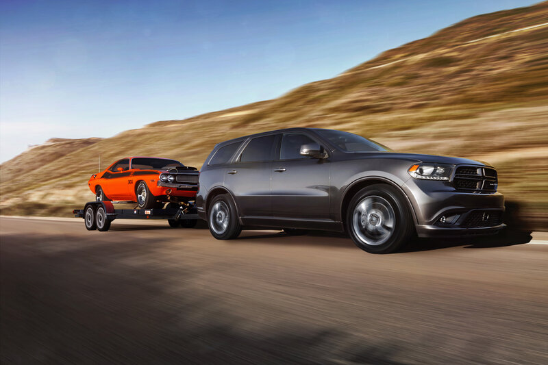 Gray Suv Towing Car