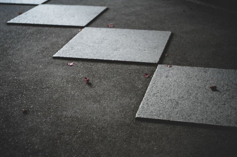 Gray Tiles on Pavement