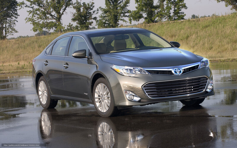 Gray Toyota Avalon on wet pavement