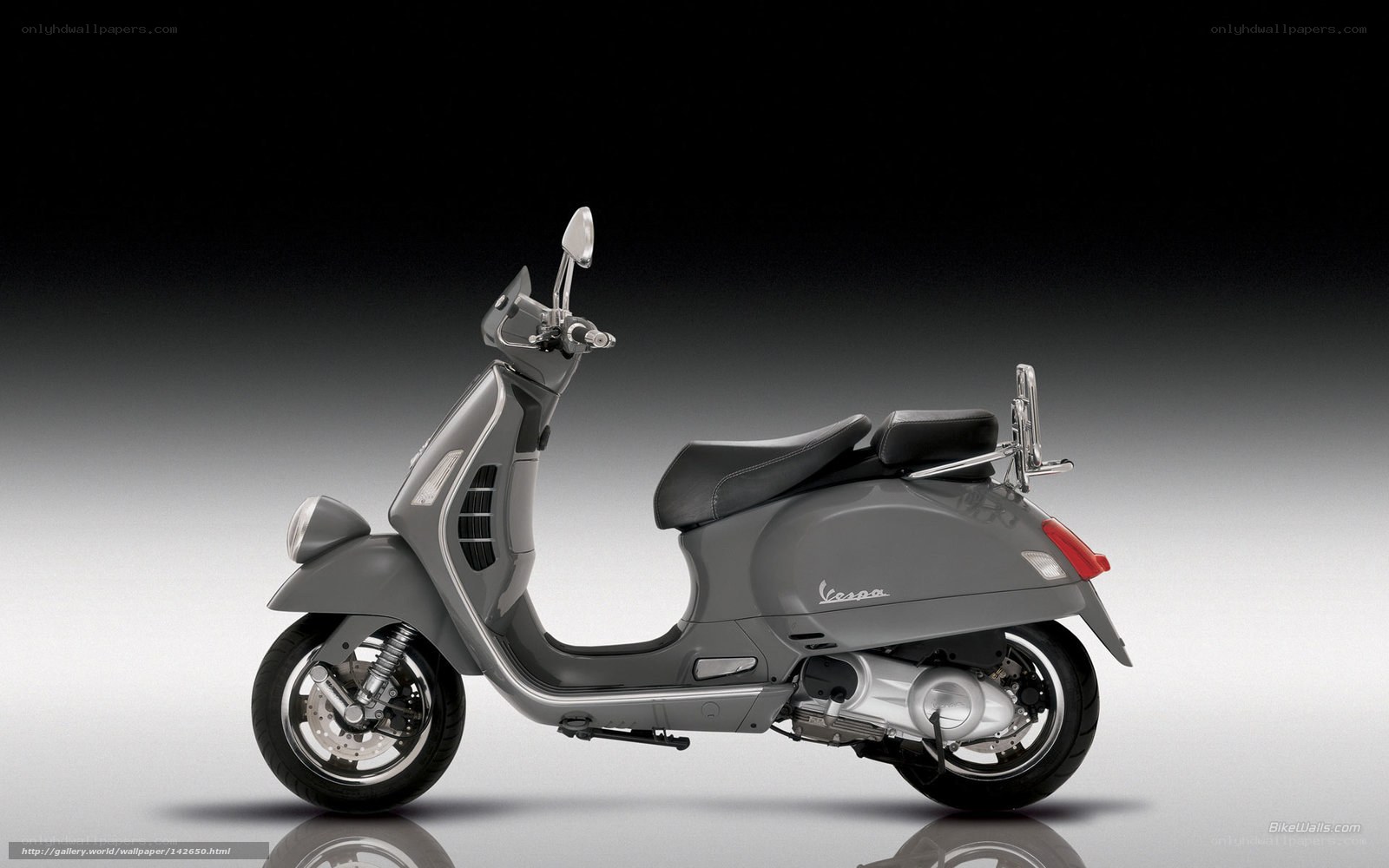 Gray Vespa scooter side profile