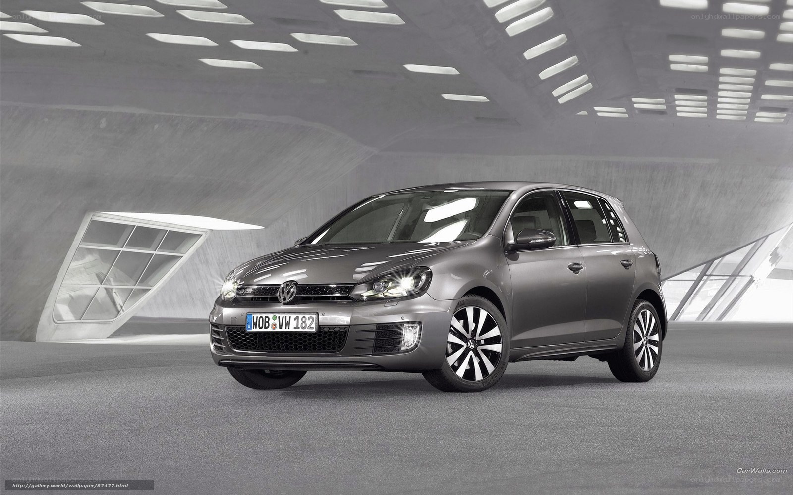 Gray Volkswagen Golf in modern setting
